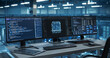 © Gorodenkoff - Modern Office Desk in a Data Center, Equipped with Multiple Monitors Displaying Complex AI Code and Data Visualizations, Ready for a Team of Developers to Dive In. Footage Without People