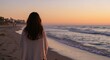 © agus - Woman on beach at sunset