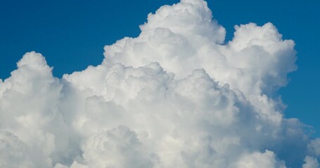 Wall Mural - Timelapse scene of big clouds mountain texture fast animate blue sky and clouds. hight quality video dci4k prores422