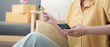 © Natee Meepian - Online Shopping. Using a credit card for mobile purchase.
