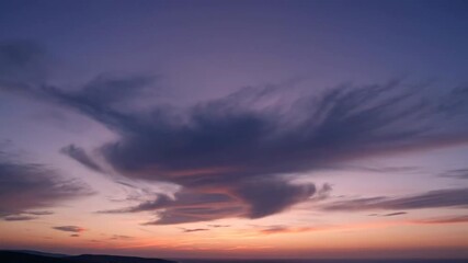 Wall Mural - Majestic Twilight Sky with Dramatic Cloud Formations and Soft Hues blue, transition, outdoors