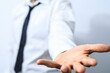 © vegefox.com - Image of a businessman's open hand, symbolizing help, support, and opportunity. Perfect for business, teamwork, and collaboration concepts