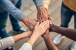© Tofayel Ahmed - Dynamic team building hands together symbolizes unity and diversity, representing a collaborative spirit for business success and community engagement