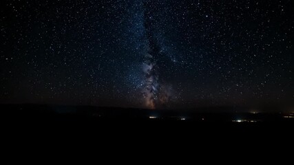 Wall Mural - Breathtaking timelapse capturing the vibrant transition from sunset to a star-filled night sky night, etheral, nightfall