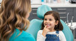 © Nur - Happy little girl at the dentist appointment smiling showing healthy teeth dental care child healthcare oral hygiene pediatric dentistry kids teeth checkup