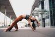 © BullRun - Young woman performing yoga backbend outdoors, graceful and powerful posture. Conceptual stock image symbolizing empowerment, mindfulness, resilience, and strength in digital lifestyle.
