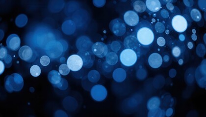 Wall Mural - Abstract blue bokeh lights on a dark background
