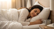 © Maicon - Woman sleeping peacefully in bed comfortable sleep wellness lifestyle restful night sleep beauty sleep