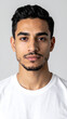 © NUGITIAR - Professional Minimalist Headshot of Young Man in White T Shirt on Light Background
