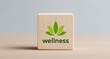 © Natawut - Wooden Block with Wellness Symbol and Green Leaf Design