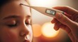© Luz - Close up of a child's forehead with a thermometer measuring fever temperature during illness care