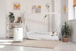 © Pixel-Shot - Interior of children's room with air purifier and bed