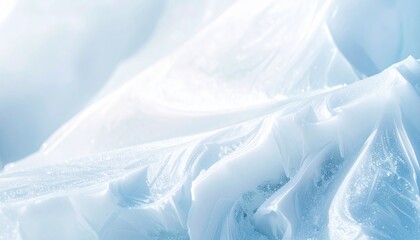 Wall Mural - Abstract blue background with a soft, frozen pattern of ice crystal flowers on a glass window for a cold winter texture and light design wallpaper