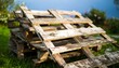 © Valentina - Wooden pallets stacked outdoors