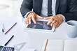 © peopleimages.com - Hands, typing and mature man in office with tablet, accounting proposal or online budget for client. Finance, digital or accountant in agency with tech, insurance plan or advisory on banking app.