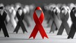 © Unplanned_Pixel - Red ribbon standing tall among black-and-white background, symbol of hope.
