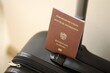 Austria passport on touristic baggage luggage in airport. Travel and tourism in Europe concept