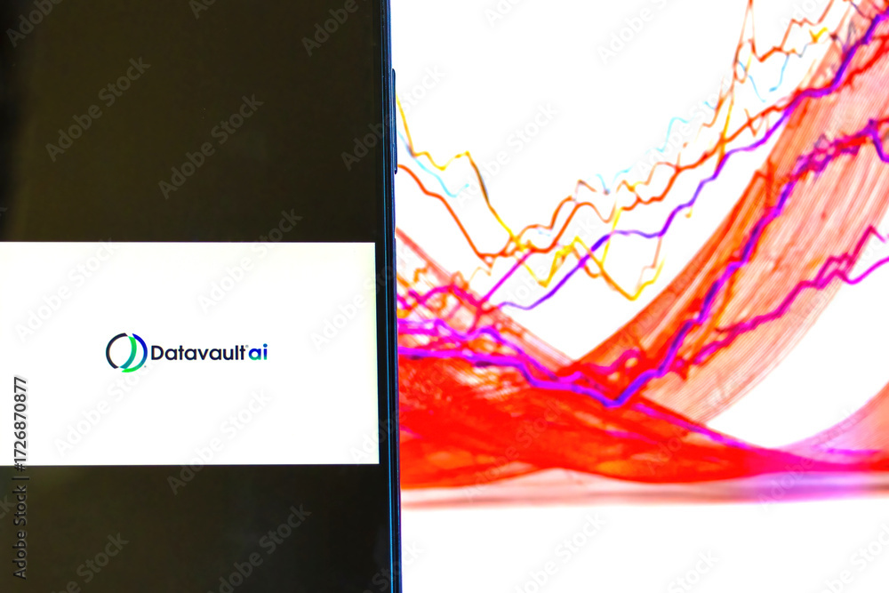 DataVaultAI logo displayed in foreground on mobile phone with stock ...