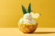 © Ousanee - pineapple ice cream nestled in a halved pineapple, adorned with vibrant green leaves and a slice of fresh fruit.