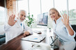© deagreez - Friendly doctor and a female patient smiling warmly during a medical consultation in a modern healthcare office