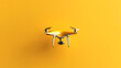 © นิโลบล ชํานาญธรรม - Minimalist design of drone in air against vibrant yellow background, showcasing modern technology and innovation