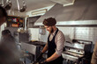 © Davor - Chef preparing food in kitchen