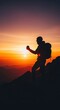 © SugarStock - Hiker silhouette with flask watching a vibrant sunset over mountains.