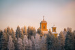 © Sanni Pii - Church and bell tower in a snowy forest