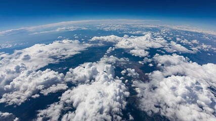Wall Mural - Curvature of planet earth. Aerial shot. Blue sky and clouds