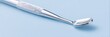 © inspiretta - Silver dental instrument with a pointed end