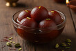 © Rajashree_75 - Rich flavorful gulab jamun bowl dessert perfect for Diwali feast