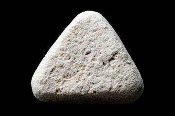 Close-up of a light beige triangular object