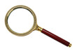 © Freya - Magnifying glass with ornate gold frame and wooden handle isolated, antique style object