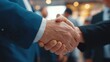 © Johannes - happy businessman and businesswoman shaking hands at group board meeting professional business executive leaders making handshake agreement successful company trade partnership handshake concept no l