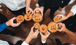 © InfiniteFlow - A vibrant display of diverse hands working together with wooden gears, illustrating teamwork, innovation, and strategic planning in a professional setting. Amity