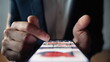 © stockbusters - Fingers moving mobile display checking social media feed online indoors closeup