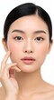 © Hellgium1SEC - Close-up studio portrait of a young Asian woman's face with perfect skin and a gentle touch, highlighting natural beauty and skincare