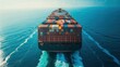 © Nurunnahar - Aerial view of a large container cargo ship sailing in the vast open sea, showcasing the scale of global trade and maritime transport industry