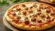 © Daisy - Mini pizza with sausage and cheese on golden background