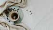 © liu - Coffee Cup and Beans on White Background – a cozy and minimalist visual. The coffee cup paired with beans on a plate creates a warm, inviting, and stylish scene.