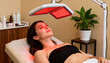 © Mario - Woman getting red light therapy on her face in a beauty spa. Concept of a cosmetic anti-aging skin rejuvenation treatment. LED phototherapy for skincare and wellness.