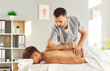 © Studio Romantic - Focused Caucasian male masseur is giving a back massage to a patient lying on a couch. Therapy healthcare session, relaxation, physiotherapy and medicine, enhancing the patient wellbeing.