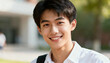 © Chlair - Portrait of a happy handsome young Asian male university student smiling at camera on campus. Concept of education, bright future, success, confidence, and positive youth lifestyle.