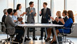 © Hannah - Diverse business team applauds a successful presentation. Colleagues congratulate male partners on a deal. Corporate success, teamwork, and achievement in a modern office meeting.