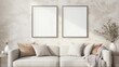 © Topa Studio - Frame mockup in contemporary living room design, two vertical frames on white wall background