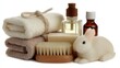 © DuangphornC - A collection of spa essentials including towels, oils, and a cute rabbit-shaped accessory, perfect for relaxation and self-care, spa basket gift with cute rabbit
