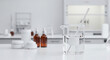 © Helena - Transparent glass beaker filled with liquid, stirring rod inside, surrounded by cosmetic containers and amber bottles in a modern laboratory setting with clean surfaces and bright lighting