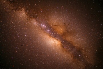 Wall Mural - Golden horizontal galaxy backdrop adorned with colorful stars