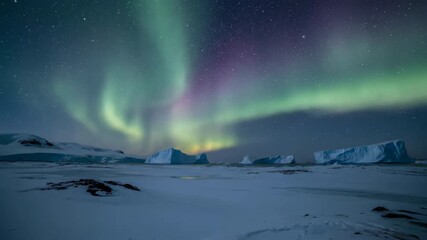 Wall Mural - ethereal northern lights unfolding across a vast arctic horizon with distant icebergs timelapse wild
