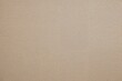 © vxnaghiyev - Overhead view of a smooth beige linen surface with ample space for promotional content